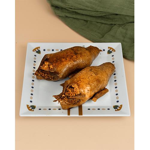 Pair of Pigeons Stuffed with Rice or Freekeh