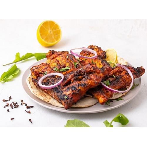 دجاجة على الفحم مع عيش بخاري